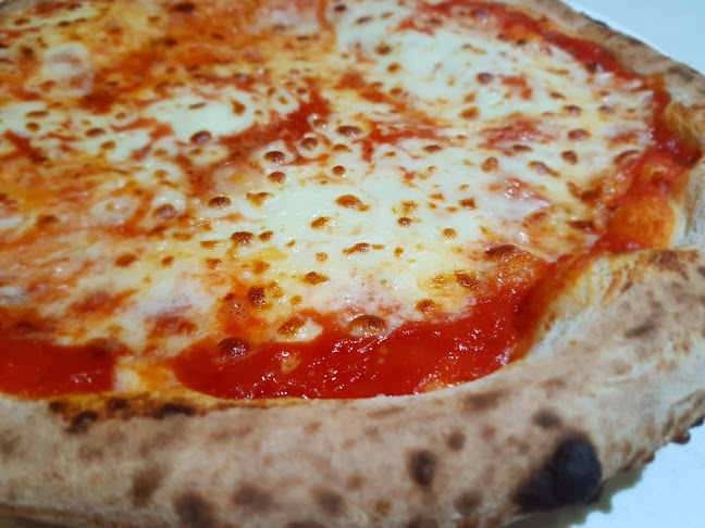 Opinii despre D.O.P Mozzarella Bar & Restaurant în Singapore - Hospitality and gastronomy