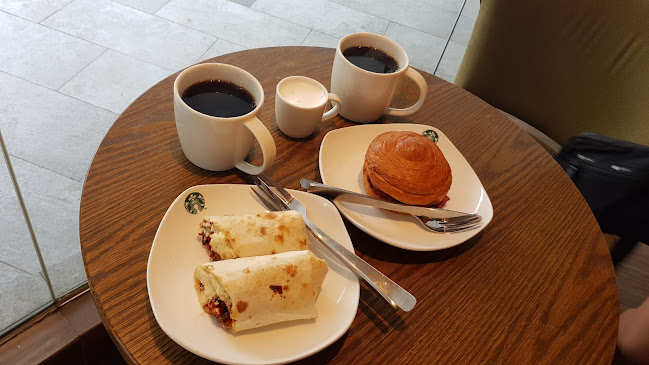 Opinii despre Starbucks Compass One în Singapore - Hospitality and gastronomy