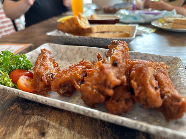 Opinii despre Golf Spot Cafe & Bistro în Singapore - Hospitality and gastronomy