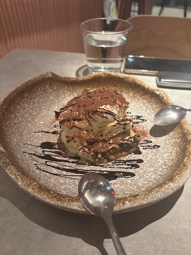 Paradise Pizza & Elixir Coffee and Wine - Holland - Singapore