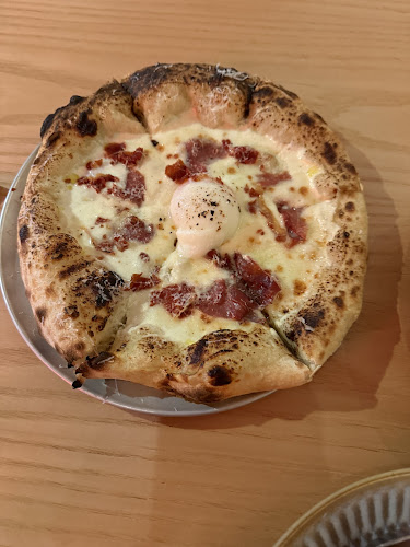 Paradise Pizza & Elixir Coffee and Wine - Holland - Singapore