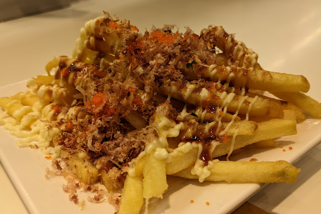 Opinii despre Genki Sushi în Singapore - Hospitality and gastronomy