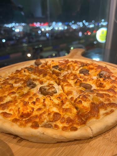 Canadian 2 For 1 Pizza - Singapore