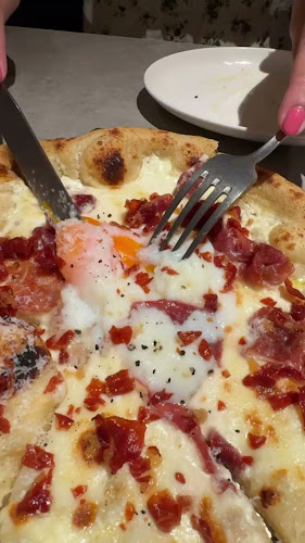 Paradise Pizza & Elixir Coffee and Wine - Holland - Singapore