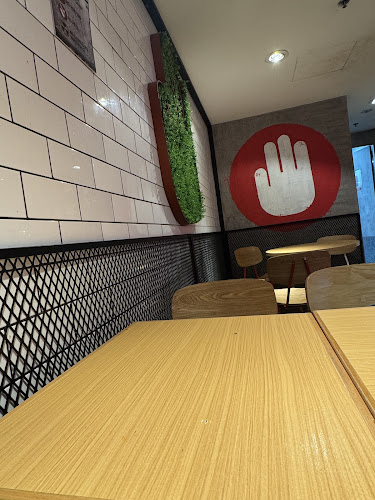 Opinii despre 4Fingers Crispy Chicken în Singapore - Hospitality and gastronomy