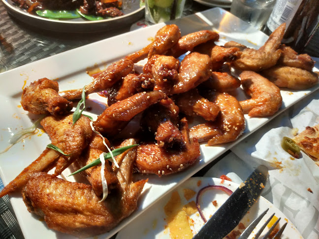 Opinii despre Wings Bar & Grill în Singapore - Hospitality and gastronomy