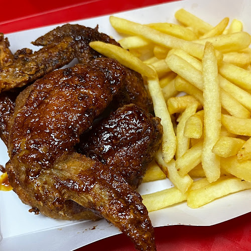 Opinii despre 4Fingers Crispy Chicken în Singapore - Hospitality and gastronomy