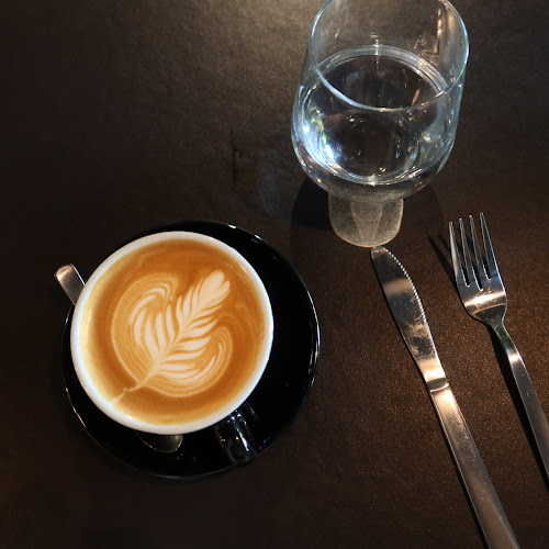 Paradise Pizza & Elixir Coffee and Wine - Holland - Singapore