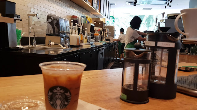 Opinii despre Starbucks Compass One în Singapore - Hospitality and gastronomy